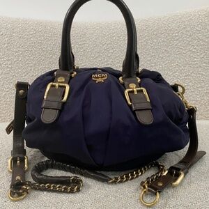 Authentic Pre-Owned MCM Visetos Original Boston bag in dark purple navy colour